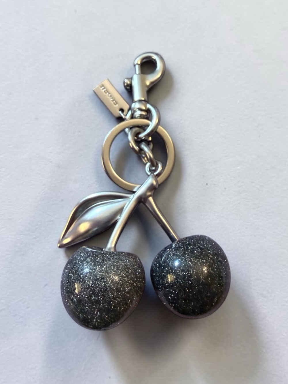 Coach Silver Sparkle Glitter Cherry Key Charm with Matte Silver Hardware, NWOT